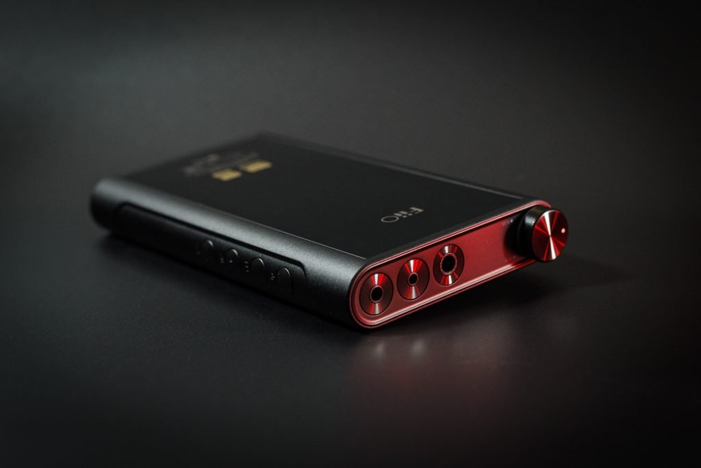 Fiio M15s looking at outputs and control knob but also showing the control buttons to one side